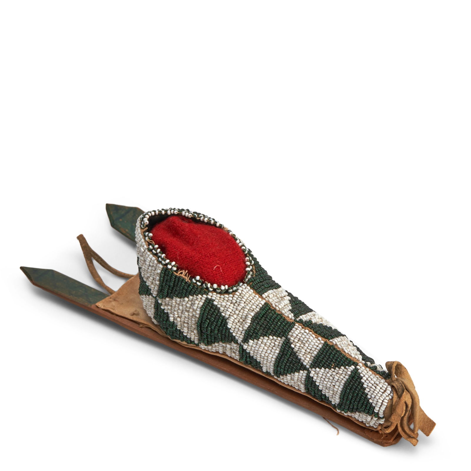 A Southern Plains beaded miniature cradle: A Southern Plains beaded miniature cradle Of hide construction with fabric lining, beaded throughout with green and white interlocking triangles, sewn on a wood frame, the ends of the slats painted wi