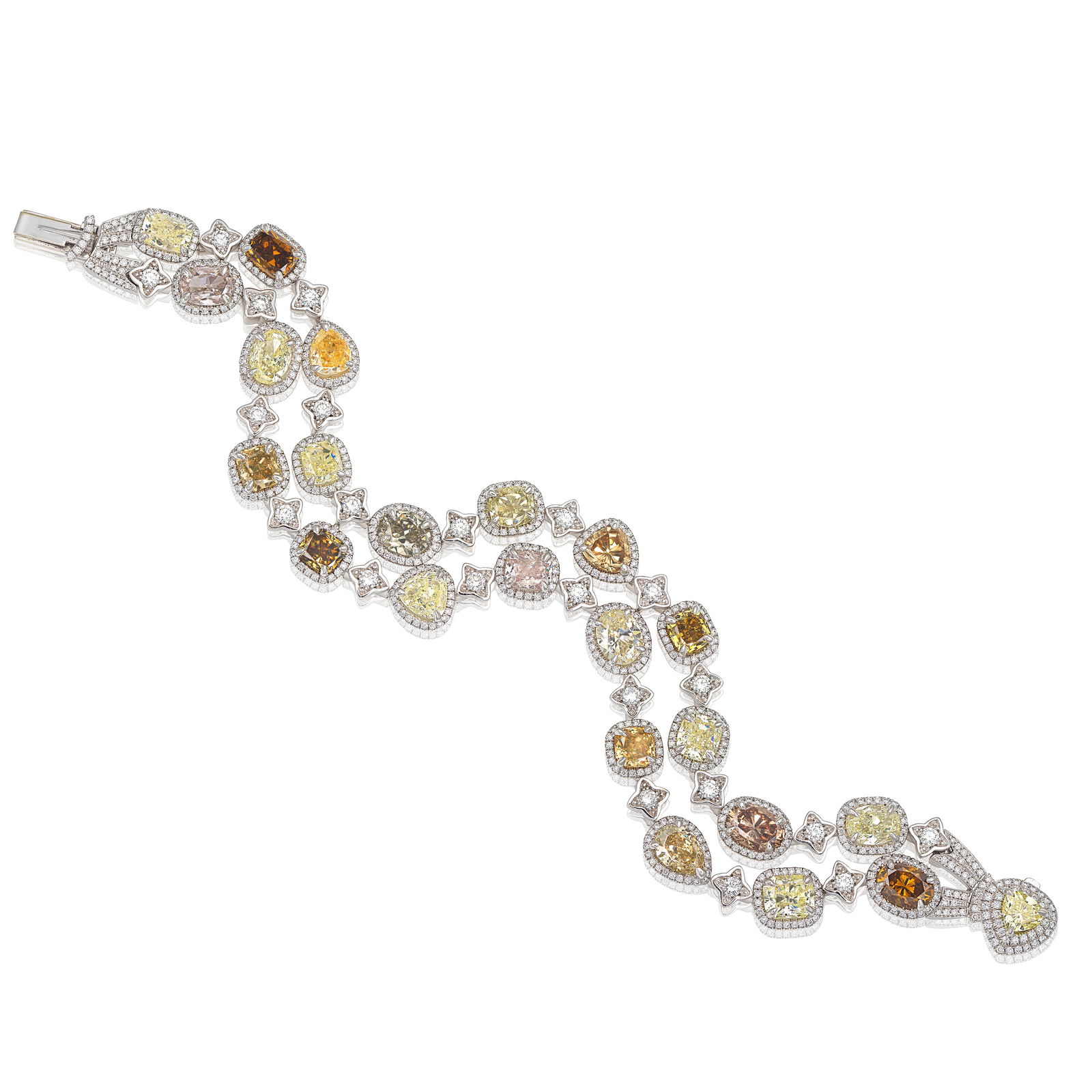 DAVID MARSHALL: DIAMOND AND COLOURED DIAMOND BRACELET, 2012: DAVID MARSHALL: DIAMOND AND COLOURED DIAMOND BRACELET, 2012 Set throughout with cushion, pear and oval-cut diamonds of yellow, brown and pink tint, within brilliant-cut diamond halo surrounds, between