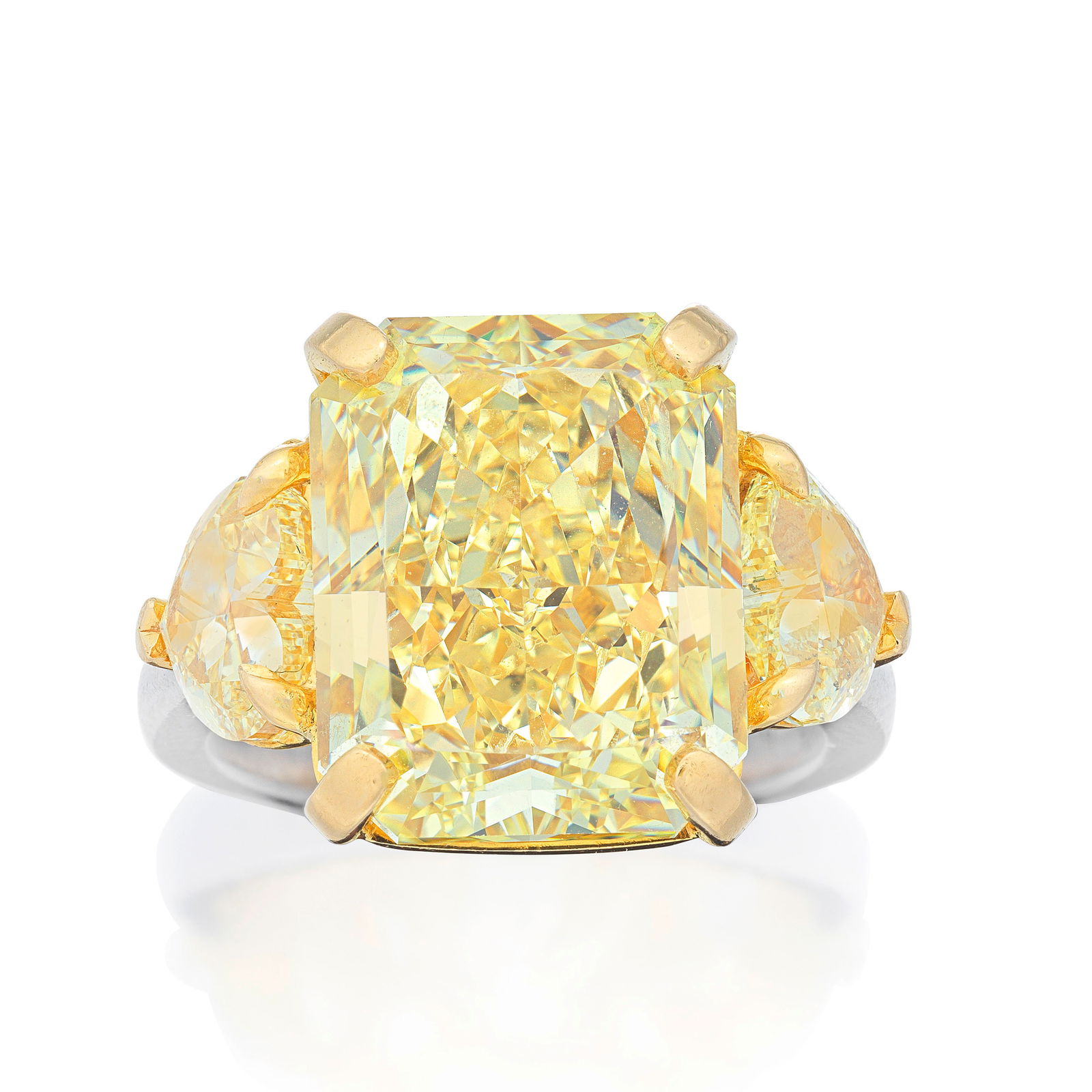 RETAILED BY DAVID MARSHALL: FANCY COLOURED DIAMOND RING: RETAILED BY DAVID MARSHALL: FANCY COLOURED DIAMOND RING The radiant-cut Fancy Yellow diamond, weighing 12.38 carats, between two heart-shaped Fancy Light Yellow diamonds, weighing 1.52 and 1.12 carats