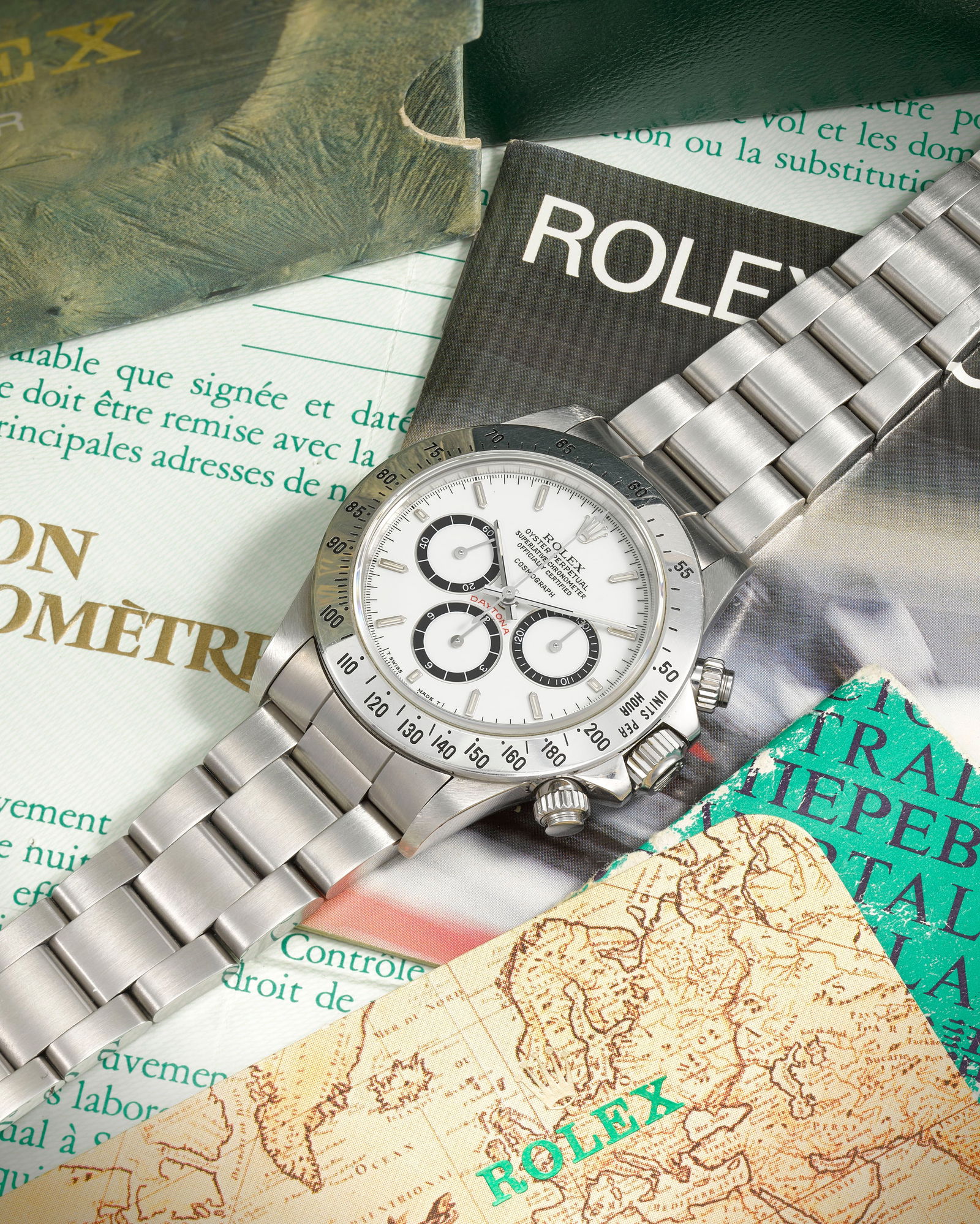 Rolex. A fine and rare stainless steel automatic chronograph bracelet watch with porcelain 'floa...: Rolex. A fine and rare stainless steel automatic chronograph bracelet watch with porcelain 'floating' Cosmograph dial Model: Porcelain 'Floating' Cosmograph 'Zenith' Daytona Reference: 16520 Date: Pur