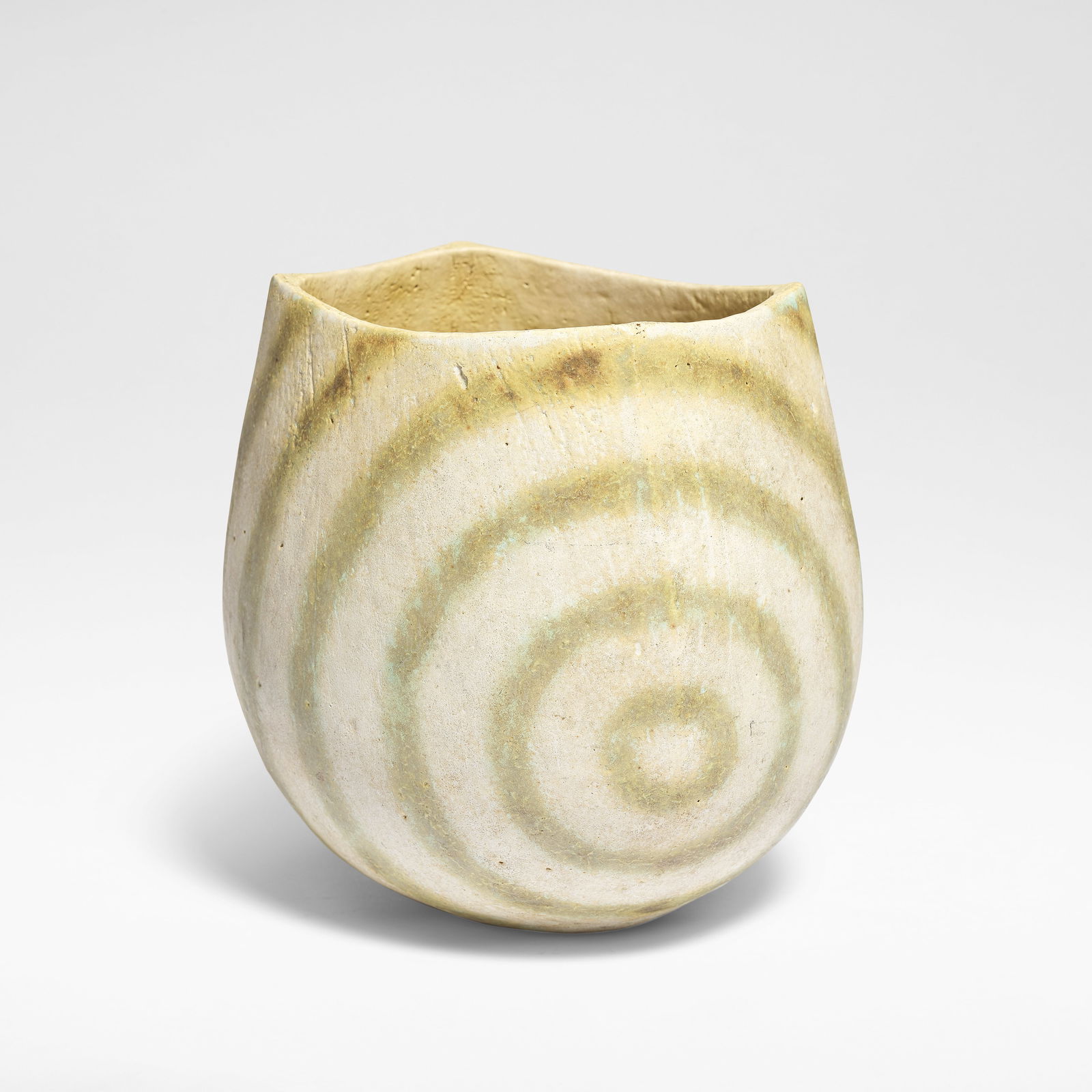 John Ward Small squared pot: John Ward Small squared pot Stoneware, cream glaze with concentric mottled blue and green bands over a softly pitted body. 13.5 cm high, 13.5 cm wide, 11.5 cm deep Underside impressed with artist's se