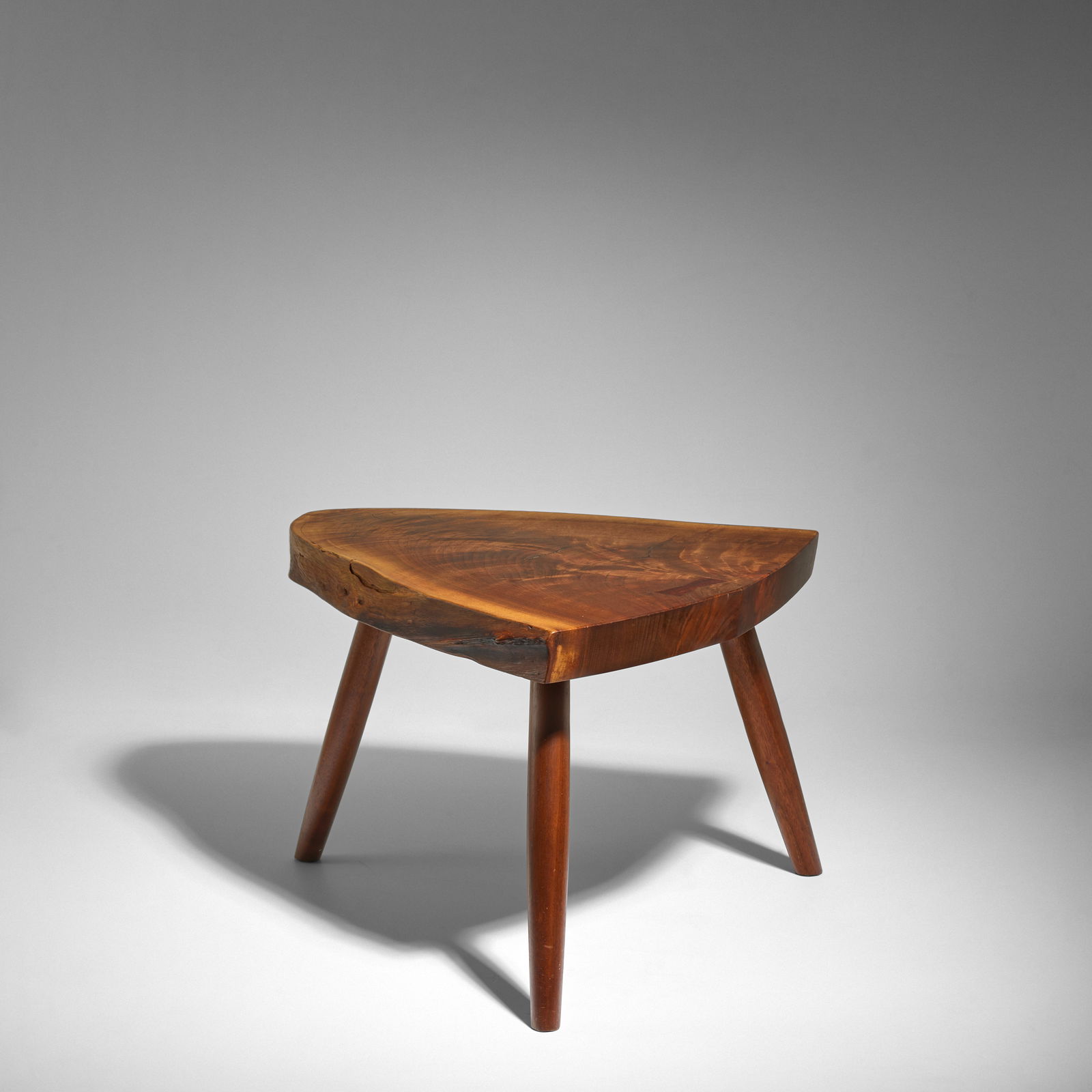 MIRA NAKASHIMA (BORN 1942) 'Plank Stool'2008American black walnut with butterfly joint and free ... (1 of 1)