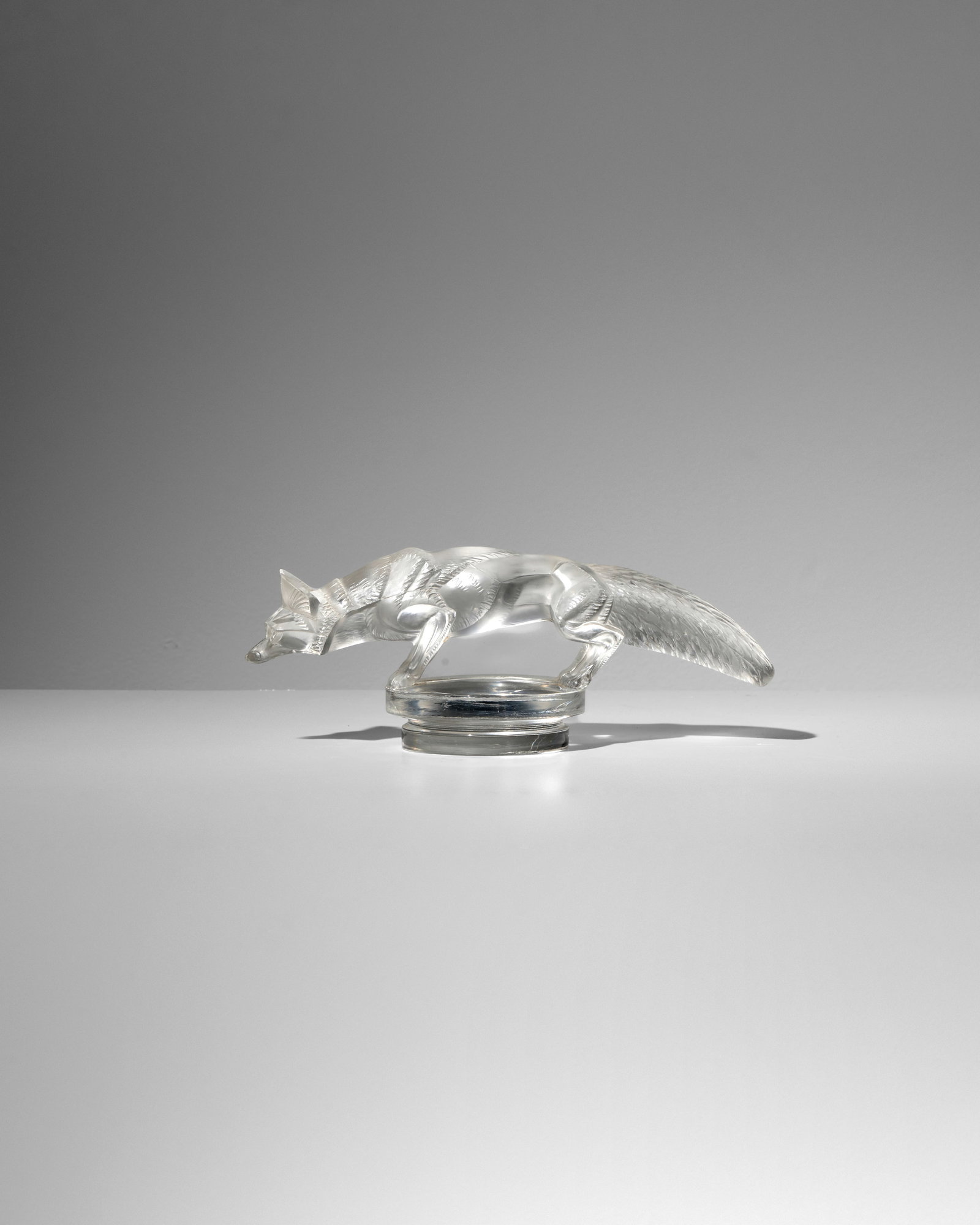 RENÉ LALIQUE (1860-1945) Renard (Fox)designed 1930Marcilhac 1182, clear and frosted glass,...: RENÉ LALIQUE (1860-1945) Renard (Fox) designed 1930 Marcilhac 1182, clear and frosted glass, hand finished, apparently unmarked height 3 1/4in (8.5cm); length 8 1/4in (21cm) Footnotes: Provenance