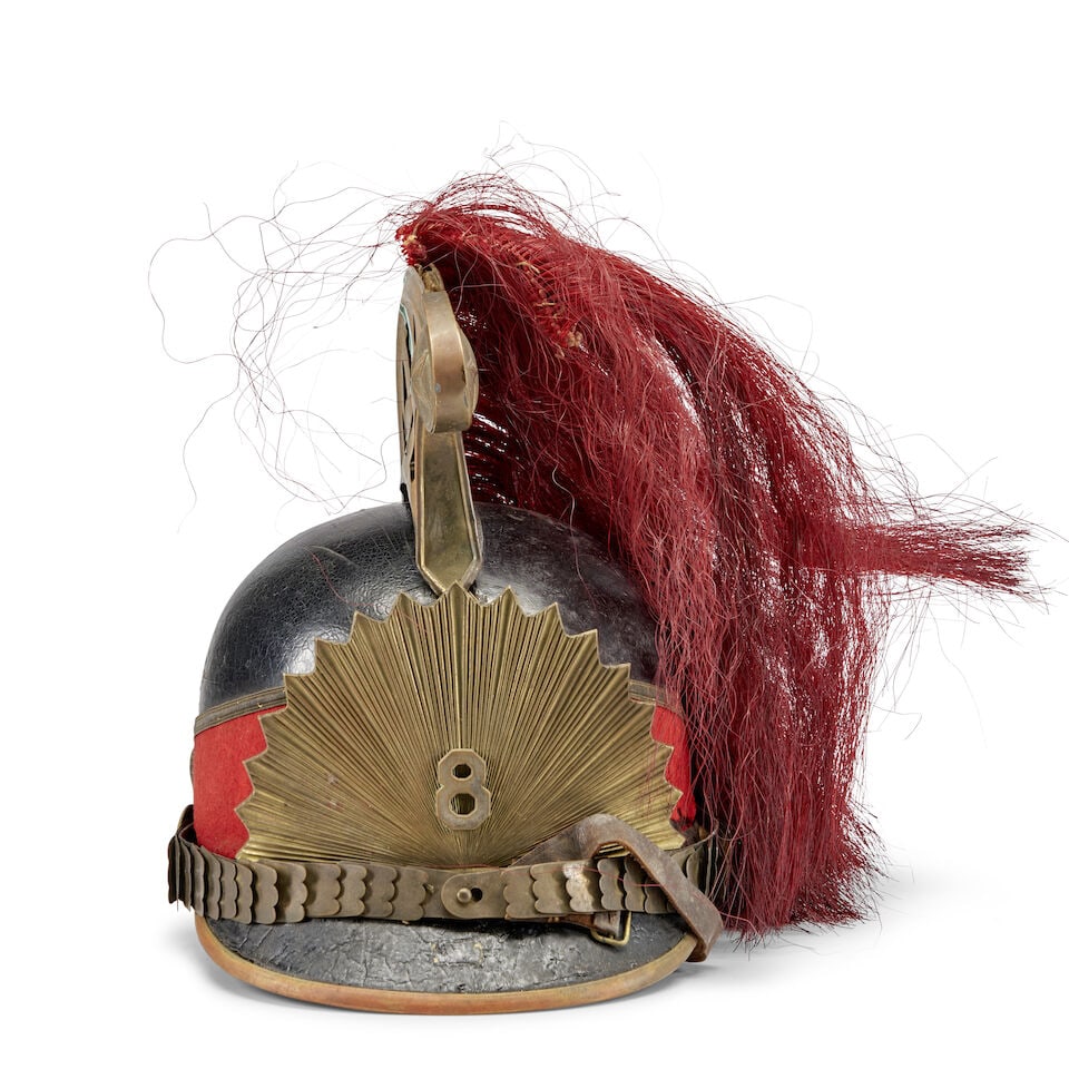 A 19TH CENTURY NEW ENGLAND MILITIA DRAGOON HELMET.: A 19TH CENTURY NEW ENGLAND MILITIA DRAGOON HELMET. Bent & Bush, Boston, Massachusetts, c. 1875. The black leather crown with red cloth band, centering an embossed brass sunburst plate with an '8' in t