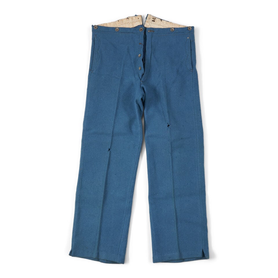 A PAIR OF CIVIL WAR SKY BLUE KERSEY TROUSERS.: A PAIR OF CIVIL WAR SKY BLUE KERSEY TROUSERS. The trousers with side pockets and tinned buttons, the waistband marked '2'. Overall lg. 38 in. For further information on this lot please visit Bonhams.c