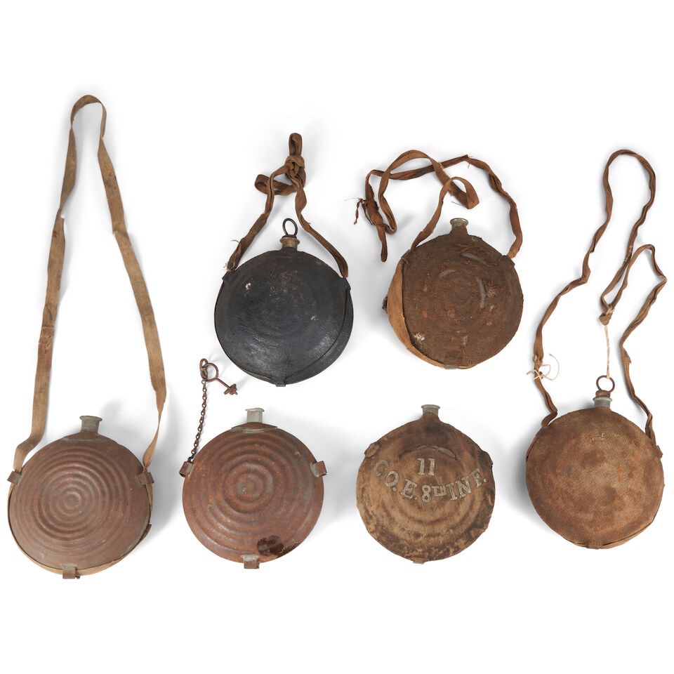 SIX CIVIL WAR MODEL 1858 BULLSEYE CANTEENS.: SIX CIVIL WAR MODEL 1858 BULLSEYE CANTEENS. Four with cloth covers, one marked '11/CO. E. 8TH INF.', one marked on the spout 'HADDEN, PORTER & BOOTH PHILA', one marked on the spout 'CH & CO. PHILA',
