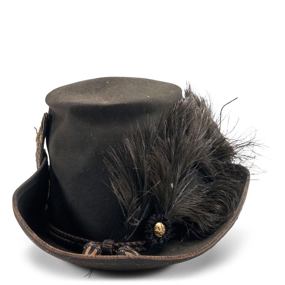 A CIVIL WAR OFFICER'S HARDEE HAT.: A CIVIL WAR OFFICER'S HARDEE HAT. Black felt body with taped edged, black and gold hat cord, gilt eagle 'I' button and ostrich plume, with embroidered eagle emblem on the side, the interior with black