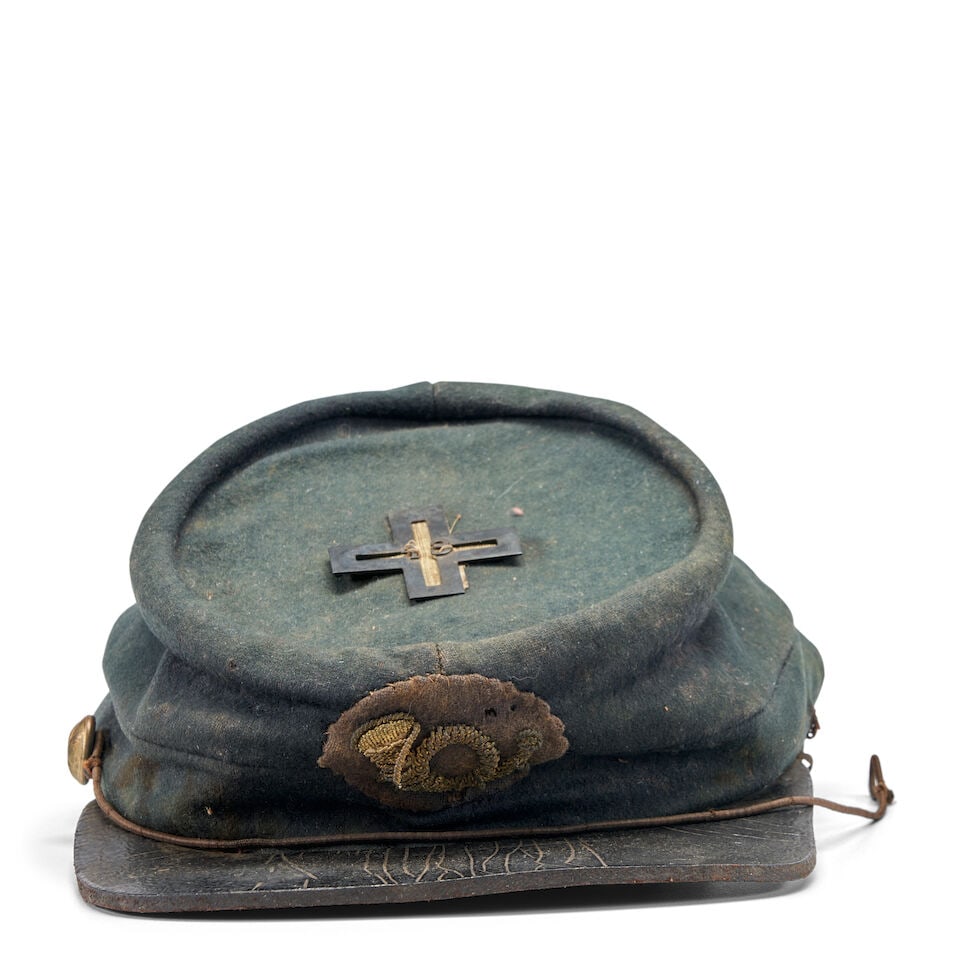 A CIVIL WAR FORAGE CAP WITH SILVER 43RD REGIMENT VI CORP BADGE.: A CIVIL WAR FORAGE CAP WITH SILVER 43RD REGIMENT VI CORP BADGE. Blue cloth body, the top with silver corps badge with '43' applied over silver braid, the front with an embroidered bugle, one gilt