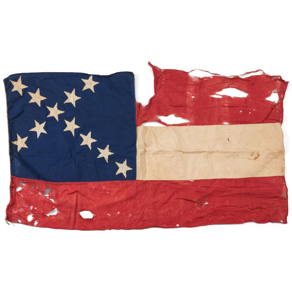A CIVIL WAR FIRST NATIONAL FLAG.: A CIVIL WAR FIRST NATIONAL FLAG. Hand-stitched, the canton with eleven stars, body with wide red and white bunting strips, cord hoist. 27, wd. 50 in. For further information on this lot please visit B
