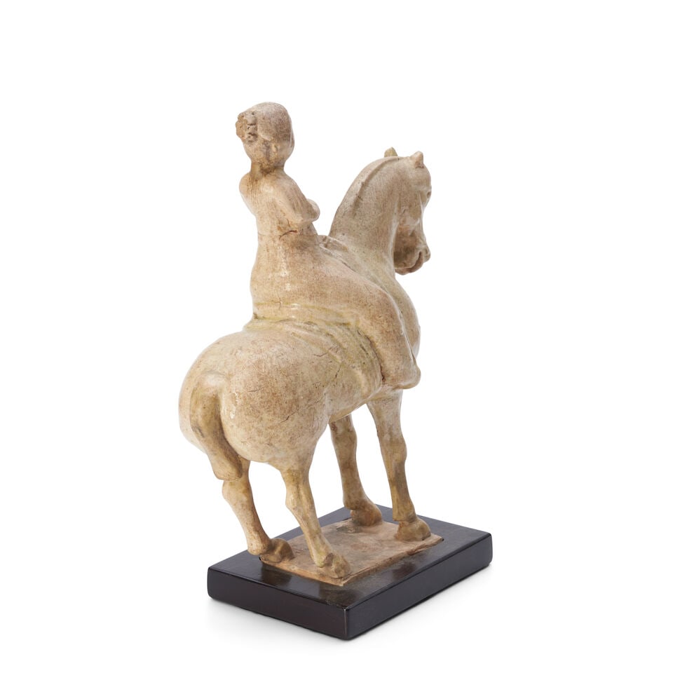 A Cream-glazed Horse and Rider China, possibly Tang dynasty, - 2