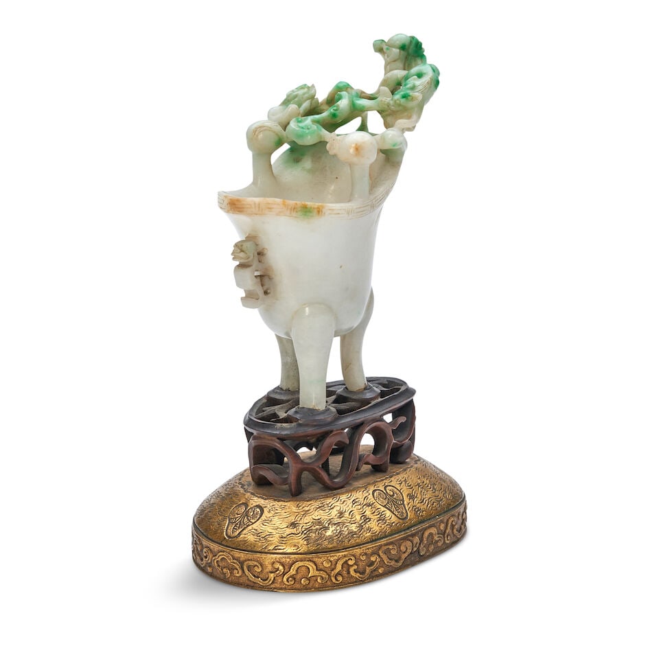 A Jadeite Archaistic Jue on a Stand China, - 2