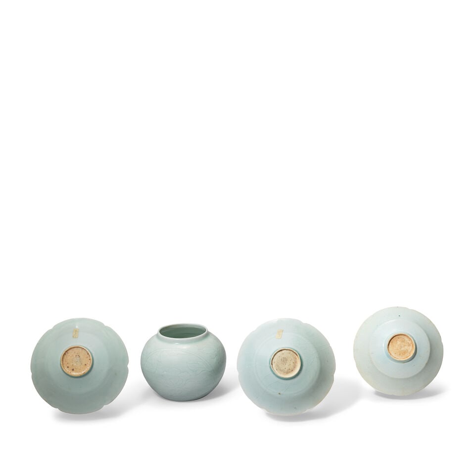 A CARVED QINGBAI 'FLORAL' JAR AND THREE QINGBAI 'FLORAL' DISHES Song Dynasty (7) - 2