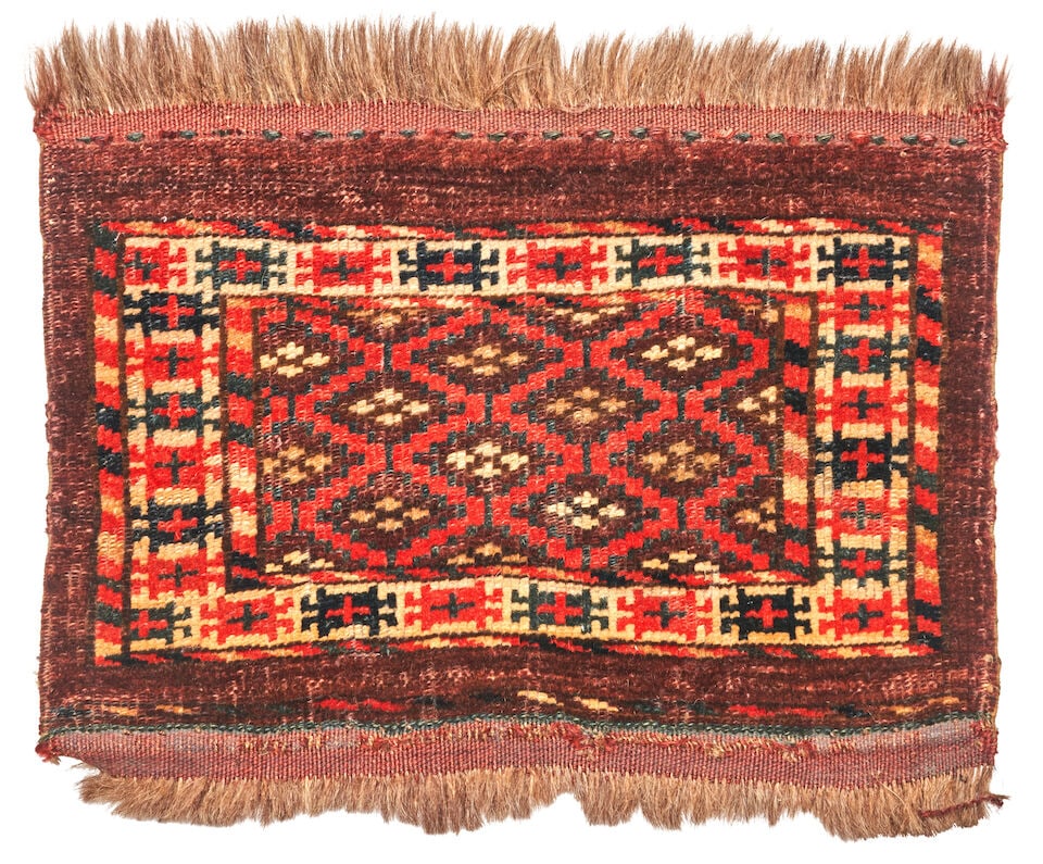 Turkoman 'Kap' Turkestan 1 ft. 5 in. x 1 ft. 2 in.: Turkoman 'Kap' Turkestan c. late 19th century 1 ft. 5 in. x 1 ft. 2 in. For further information on this lot please visit Bonhams.com For further information about this lot please visit the lot