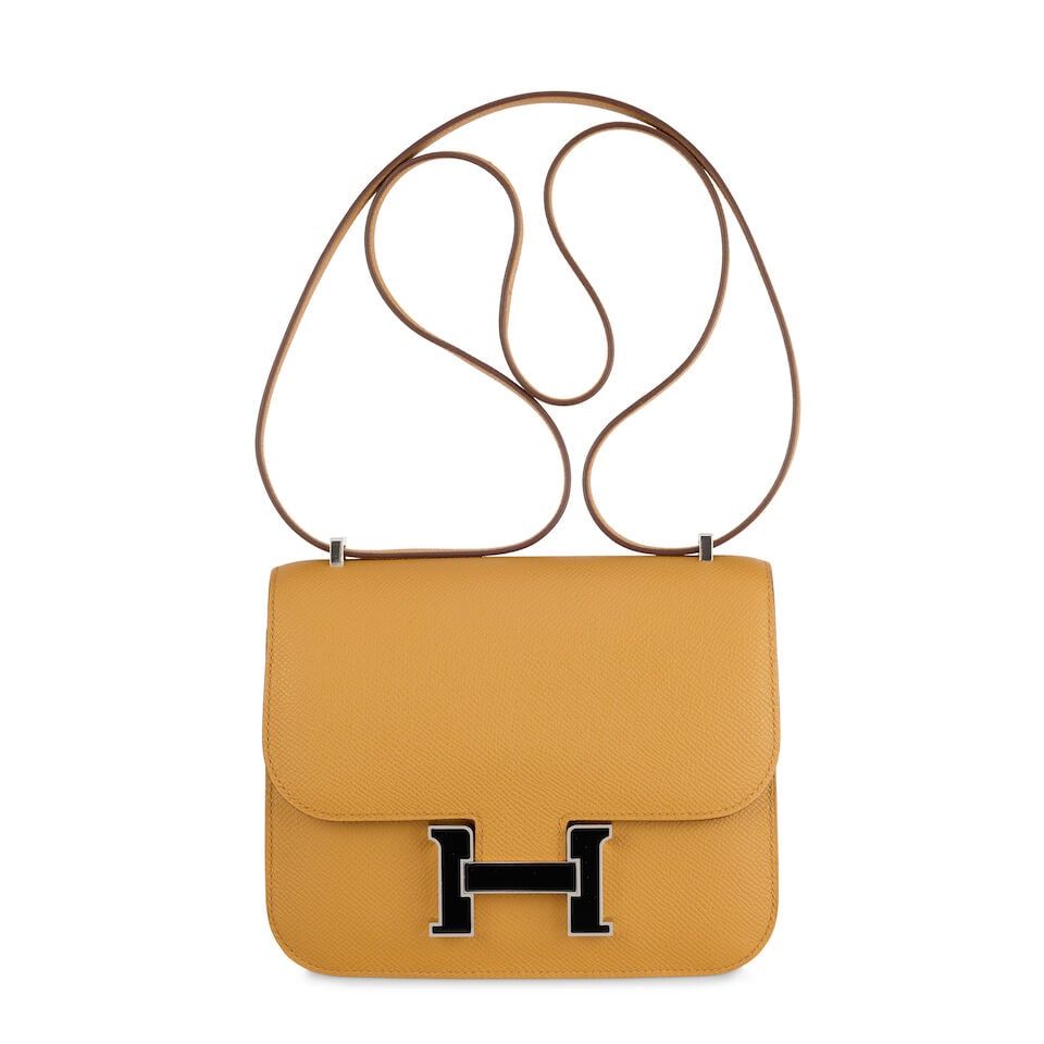 Hermès: a Sesame Epsom Leather Miroir Constance 18 2023 (includes mirror, felt protector, d...: Hermès: a Sesame Epsom Leather Miroir Constance 18 2023 Palladium and black enamelled lacquer hardware Condition Grade A- 18.5cm wide, 15.5cm high, 5cm deep, 26cm/51cm shoulder drop, includes