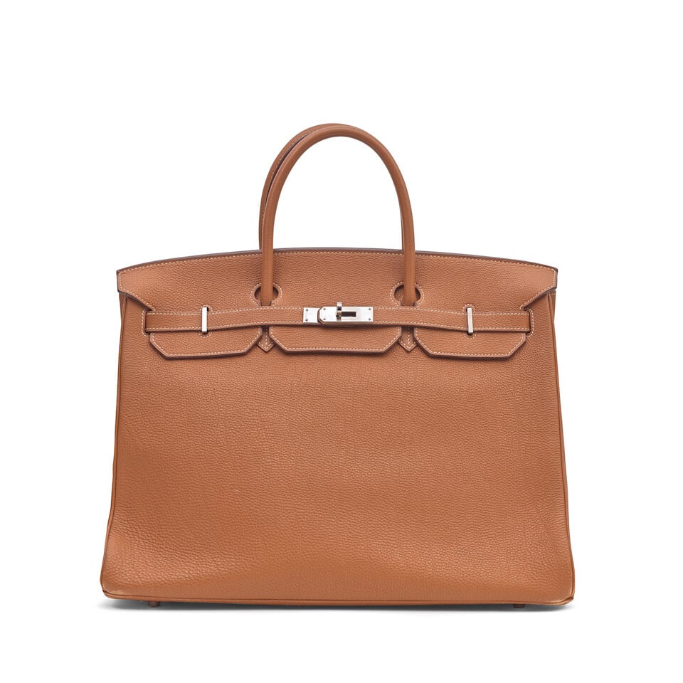 Hermès: a Gold Togo Leather Birkin 40 2005 (includes dust bag): Hermès: a Gold Togo Leather Birkin 40 2005 Palladium hardware Condition Grade B- (padlock, keys, cloche missing) 40cm wide, 28cm high, 20cm deep, 9cm handle drop, includes dust bag For further