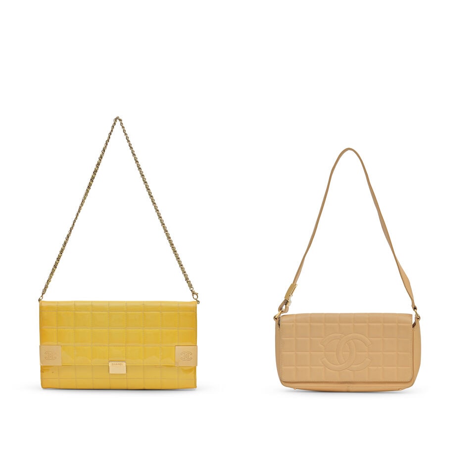 Chanel: Two Chocolate Quilted Shoulder Pochettes 2000s (Both includes serial sticker and authent...: Chanel: Two Chocolate Quilted Shoulder Pochettes 2000s Creative Director: Karl Lagerfeld To include a 2003-04 beige chocolate quilted lambskin CC shoulder pochette, gold tone hardware, 25cm wide,