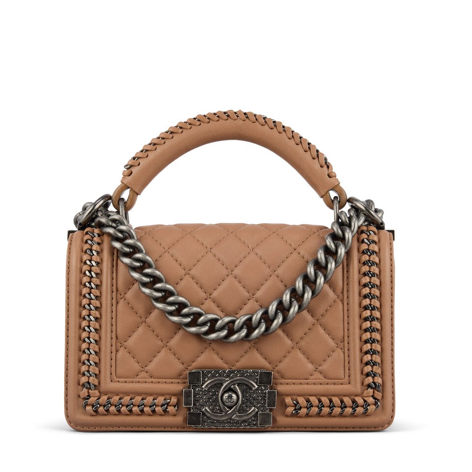 Chanel: a Dark Beige Lambskin Top Handle Small Boy Bag 2016-17 (includes serial sticker, authent...: Chanel: a Dark Beige Lambskin Top Handle Small Boy Bag 2016-17 Creative Director: Karl Lagerfeld Quilted lambskin with gunmetal hardware, quilted lock plate and braided trim details Condition Grade