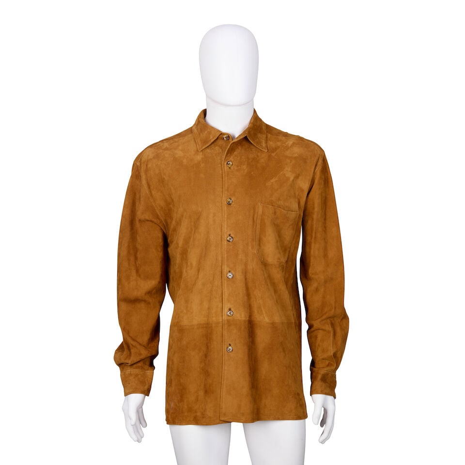 Loro Piana: a Men's Brown Suede Overshirt: Loro Piana: a Men's Brown Suede Overshirt Shirt collar with button up closure, single patch pocket to the chest Condition Grade B+ Labelled size L, approximate measurements: 42' shoulder, 48' chest, 4