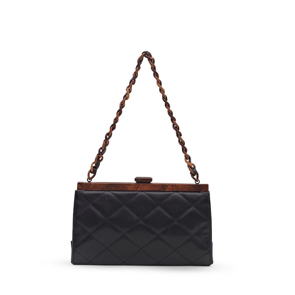 Chanel: a Black Quilted Leather and Wooden Frame Shoulder Bag 2000-02 (includes serial sticker a... - 2