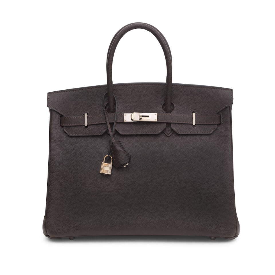 Hermès: an Ardennes Leather Ebene Birkin 35 2006 (includes padlock, keys, cloche, protectiv...: Hermès: an Ardennes Leather Ebene Birkin 35 2006 Palladium hardware Condition Grade B+ 34.5cm wide, 28cm high, 18cm deep, 10cm handle drop, includes padlock, keys, cloche, protective felts,