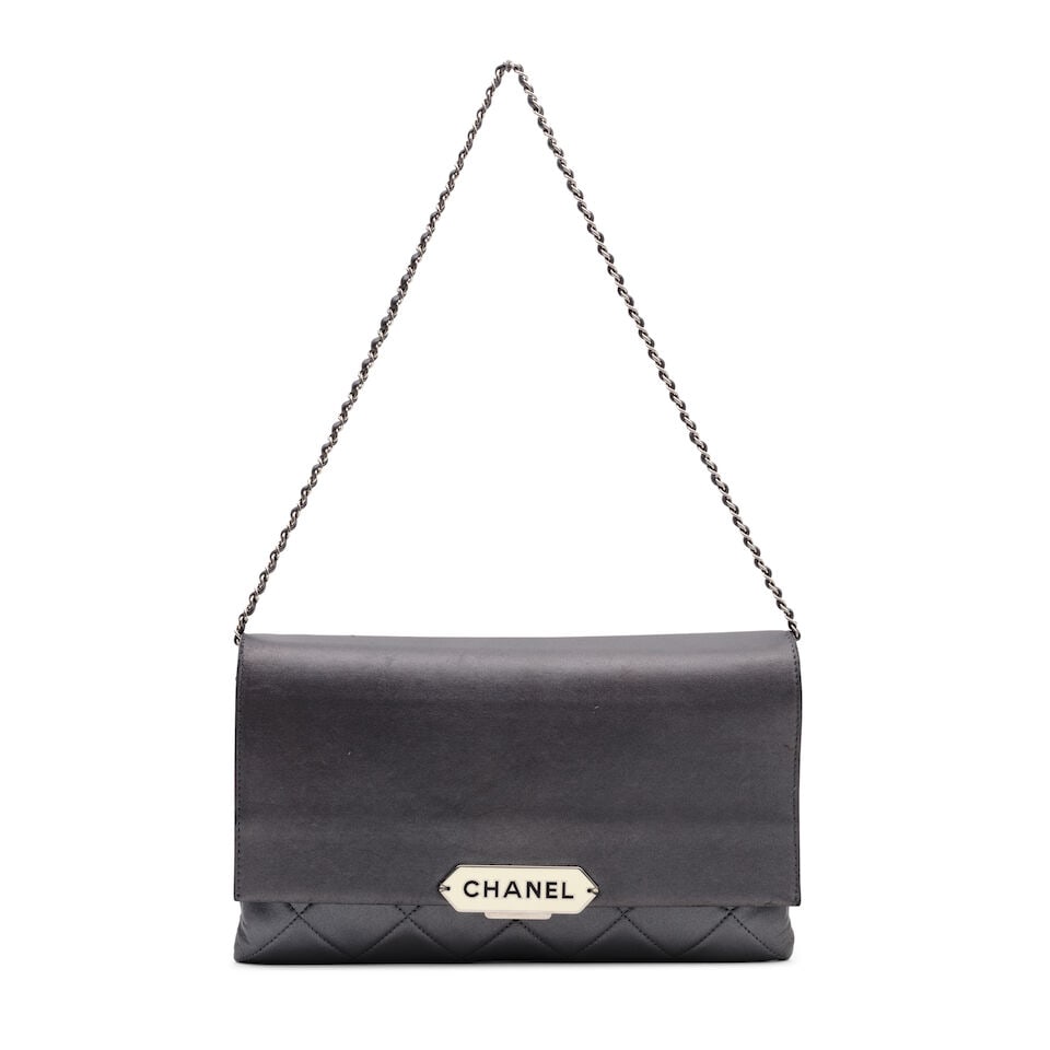 Chanel: a Silver Leather Retro Label Clutch Bag on Chain 2016-17 (includes serial sticker, authe... (1 of 2)