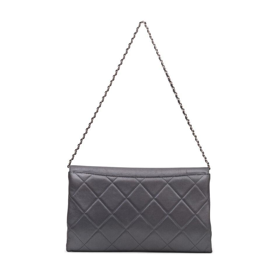 Chanel: a Silver Leather Retro Label Clutch Bag on Chain 2016-17 (includes serial sticker, authe... - 2