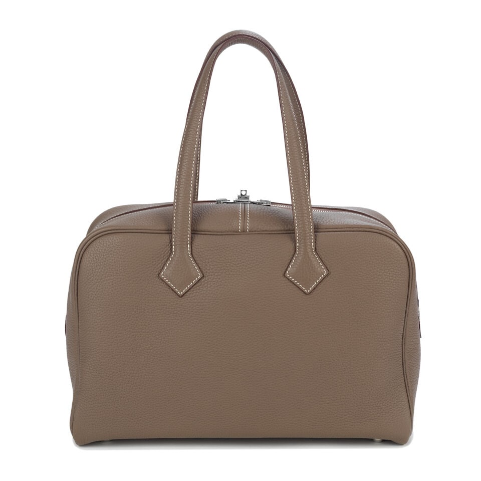 Hermès: an Etoupe Clemence Leather Victoria II 35 2014 (includes padlock, keys, cloche, dus...: Hermès: an Etoupe Clemence Leather Victoria II 35 2014 Palladium hardware Condition Grade A- 35cm wide, 22cm high, 19cm handle drop, includes padlock, keys, cloche, dust bags and box For