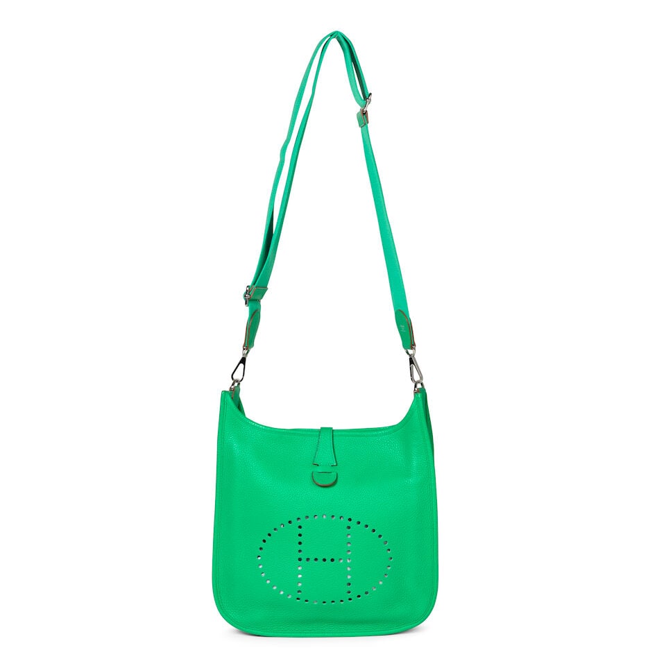 Hermès: a Menthe Clemence Leather Evelyne III GM 2012 (includes dust bag): Hermès: a Menthe Clemence Leather Evelyne III GM 2012 Palladium hardware Condition Grade B+ 29cm wide, 28cm high, 8cm deep, adjustable canvas shoulder strap, includes dust bag For further