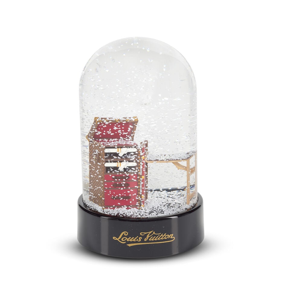 Louis Vuitton: a Damier Stokowski Trunk Snow Globe 2011 (includes box): Louis Vuitton: a Damier Stokowski Trunk Snow Globe 2011 Featuring a miniature model of the 1929 desk designed for conductor Leopold Stokowski with J.S Bach music manuscripts on the fold-out desk Condi