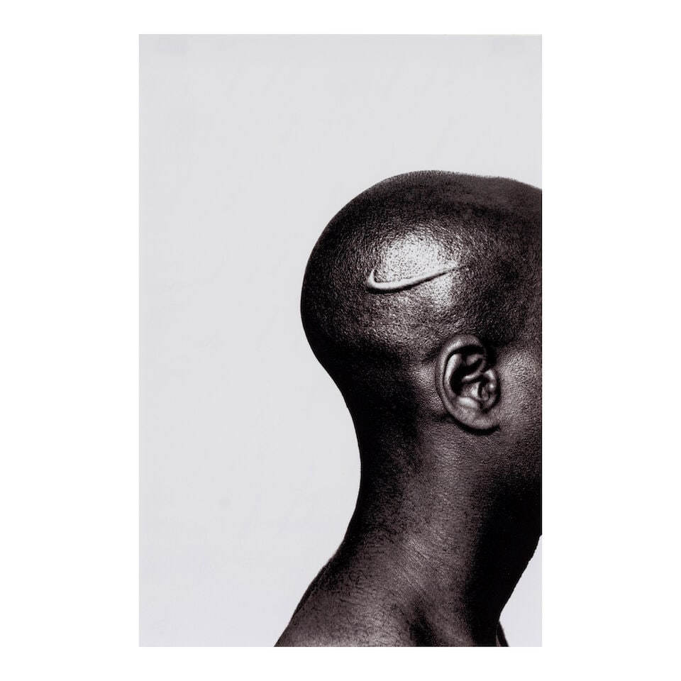 Hank Willis Thomas (born 1976); Branded Head;: Hank Willis Thomas (born 1976) Branded Head, 2003 Chromogenic print; signed, dated, and editioned 'A/P' in ink on the reverse, framed. 20 x 13 3/4 in. (50.8 x 33.7 cm.) Footnotes: Provenance San Fran