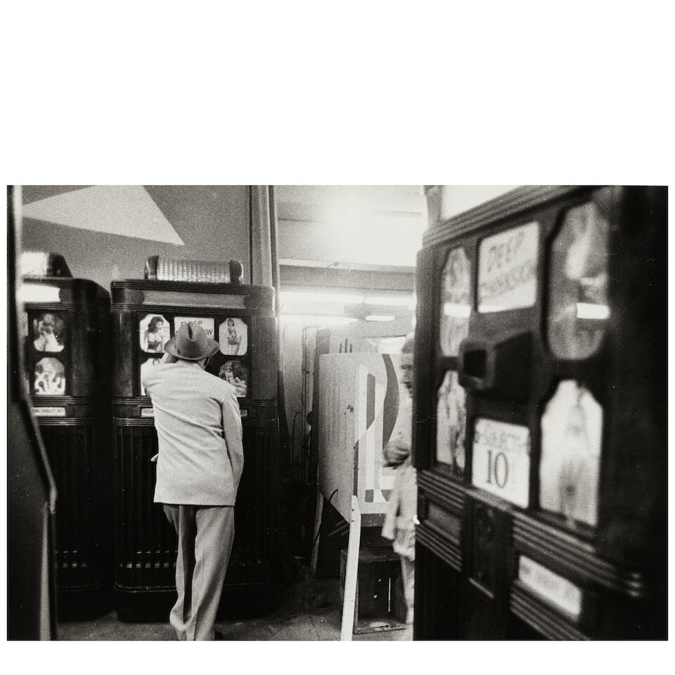 Robert Frank (1924-2019); Peep Show (Times Square, New York City);: Robert Frank (1924-2019) Peep Show (Times Square, New York City), c. 1960 Gelatin silver print, printed before 1978; signed in ink in the margin, the photographer's Archive and copyright stamps, with