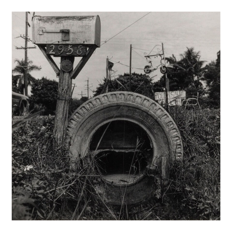 Robert Rauschenberg (1925-2008); Mailbox and Tire;: Robert Rauschenberg (1925-2008) Mailbox and Tire, 1979 Gelatin silver print; signed, dated, and inscribed 'For Richard' in orange ink in the margin, framed. 7 x 7 in. (17.8 x 17.8 cm.) sheet 10 x 8 in