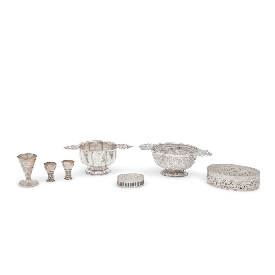 A Collection of continental silver 19th century/early 20th century (7): A Collection of continental silver 19th century/early 20th century Comprising two pedestal brandy bowls, probably Hanau, one of lobed circular form and engraved with a coat of arms, the other of