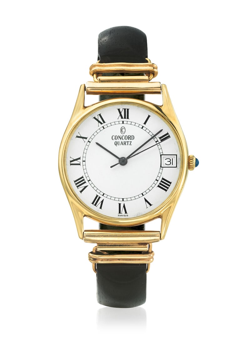 CONCORD. A 14K GOLD QUARTZ CALENDAR BRACELET WATCHc. 1980s (1 of 1)