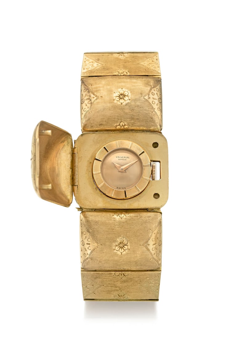 UNIVERSAL. AN 18K GOLD MANUAL WIND BRACELET WATCH WITH CONCEALED DIAL, CONTRACT CASE AND BRACELE... (1 of 2)
