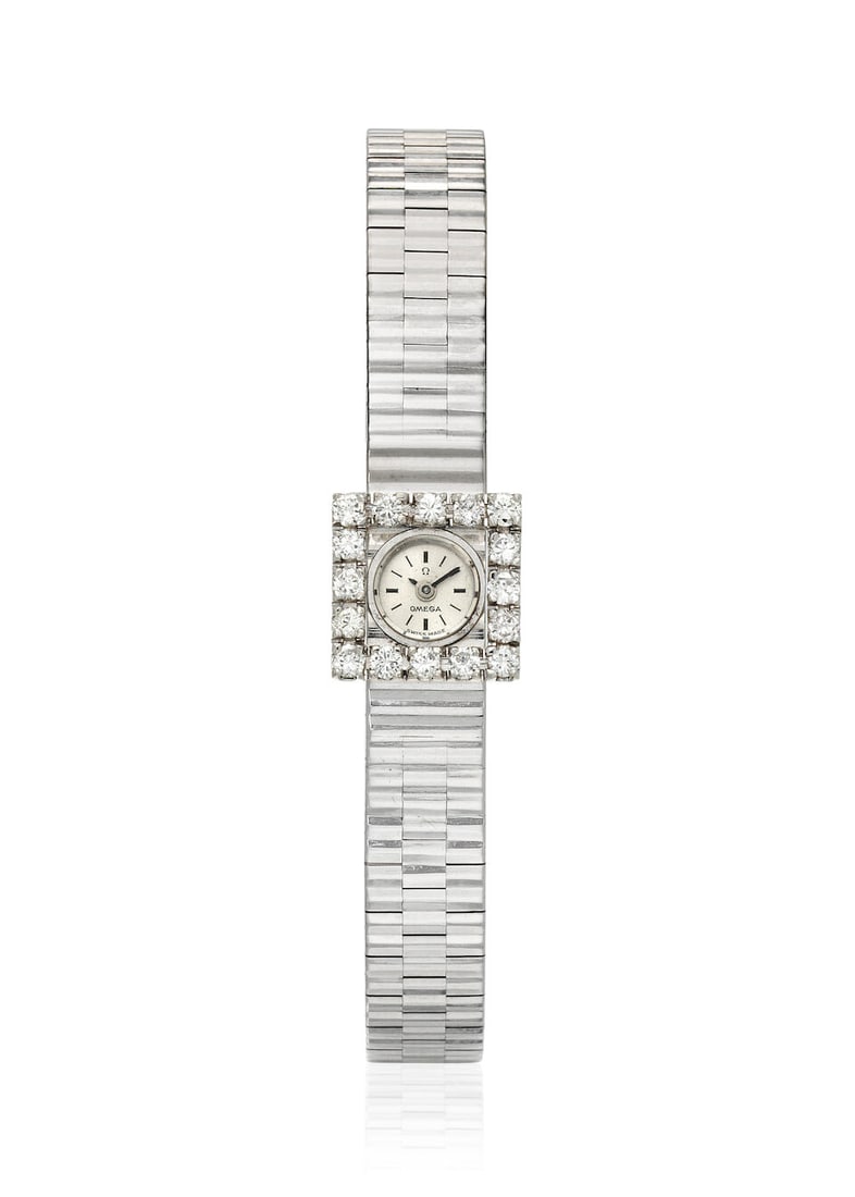 OMEGA. AN 18K WHITE GOLD DIAMOND SET MANUAL WIND BRACELET WATCHc. 1960s (1 of 1)