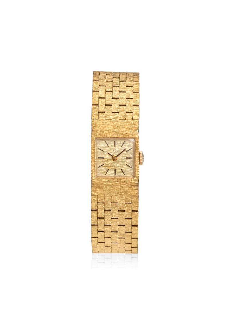 OMEGA. A GOLD PLATED MANUAL WIND BRACELET WATCHRef: H5360, c. 1974 (1 of 2)