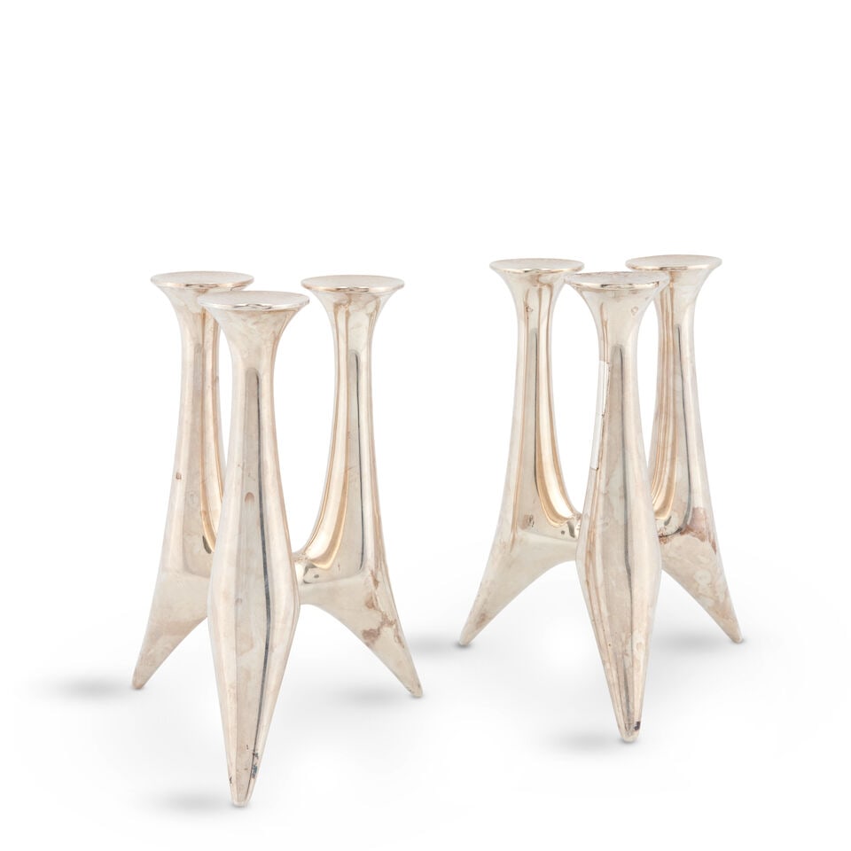 PAIR OF BENT GABRIELSEN (1928-2014) FOR HANS HANSEN 494 CANDELABRA Denmark, dated 1957, sterling...: PAIR OF BENT GABRIELSEN (1928-2014) FOR HANS HANSEN 494 CANDELABRA Denmark, dated 1957, sterling silver, incised mark 'Hans Hansen, DENMARK STERLING' and 'ANNO 1957, 494,' ht. 7 1/4 in. For further