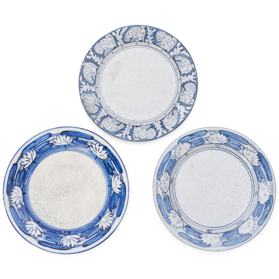 TWO DEDHAM POTTERY 'POND LILY' PLATES AND A 'TURKEY' PLATE Dedham, Massachusetts, 1896-1929, gla... (1 of 2)