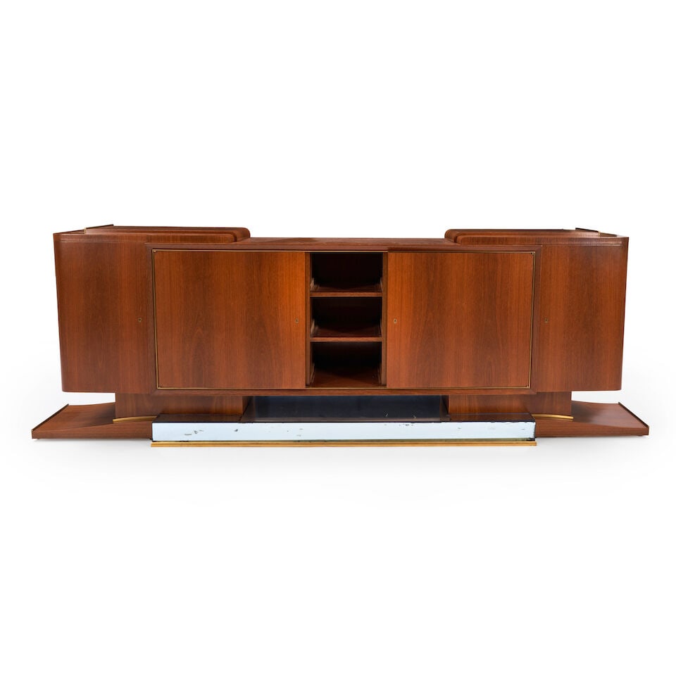 FRENCH ART DECO CREDENZA IN THE MANNER OF JEAN PASCAUD c. 1930, mirror glass, walnut veneer, wal...: FRENCH ART DECO CREDENZA IN THE MANNER OF JEAN PASCAUD c. 1930, mirror glass, walnut veneer, walnut, unmarked, ht. 37, lg. 111 1/2, dp. 18 1/2 in. Lot to be sold without reserve. This lot is subject t