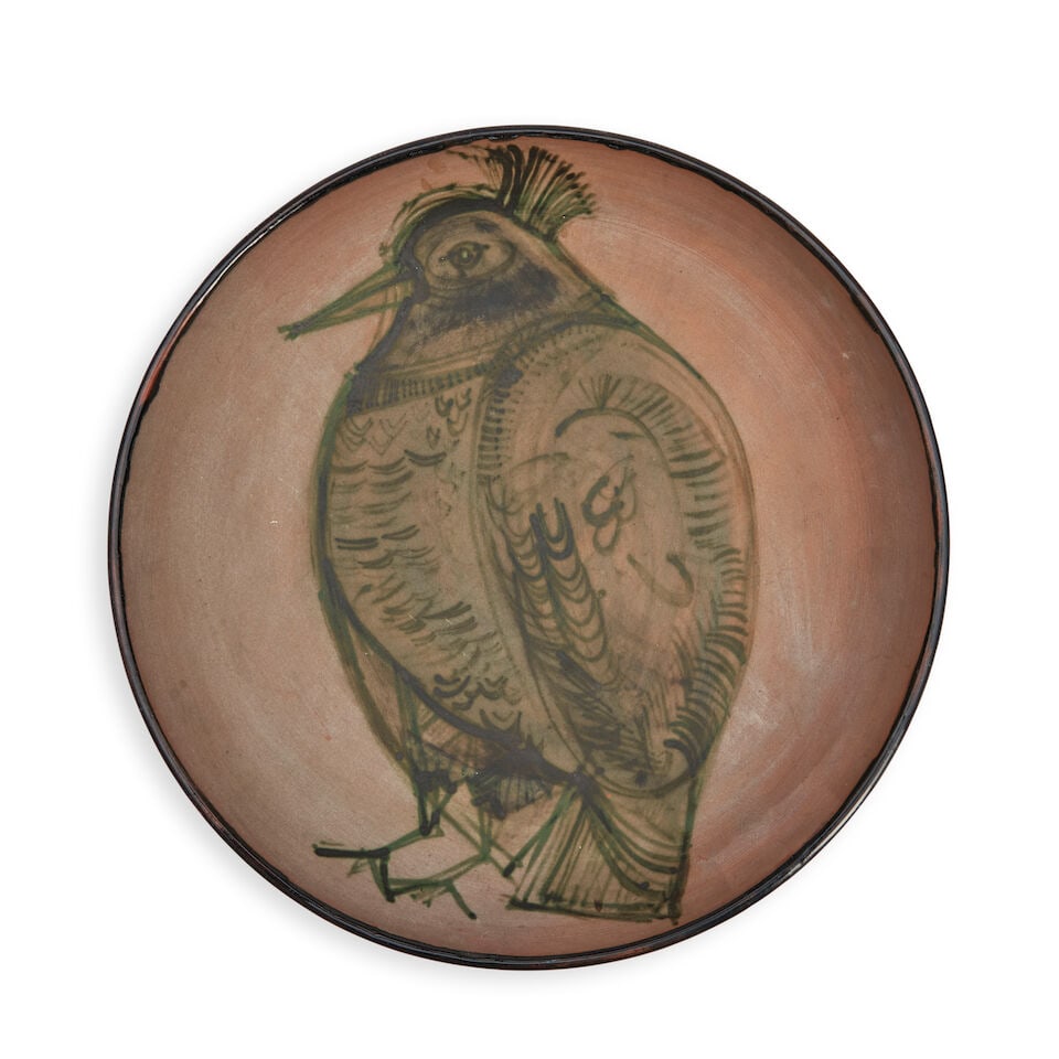 JACQUES INNOCENTI (1926-1961) CHARGER DEPICTING A BIRD Vallauris, France, dated 1957, glazed cer...: JACQUES INNOCENTI (1926-1961) CHARGER DEPICTING A BIRD Vallauris, France, dated 1957, glazed ceramic, marked 'J. Innocenti Vallauris 1957,' dia. 12 1/2 in. Footnotes: Private Collection, St. Louis,