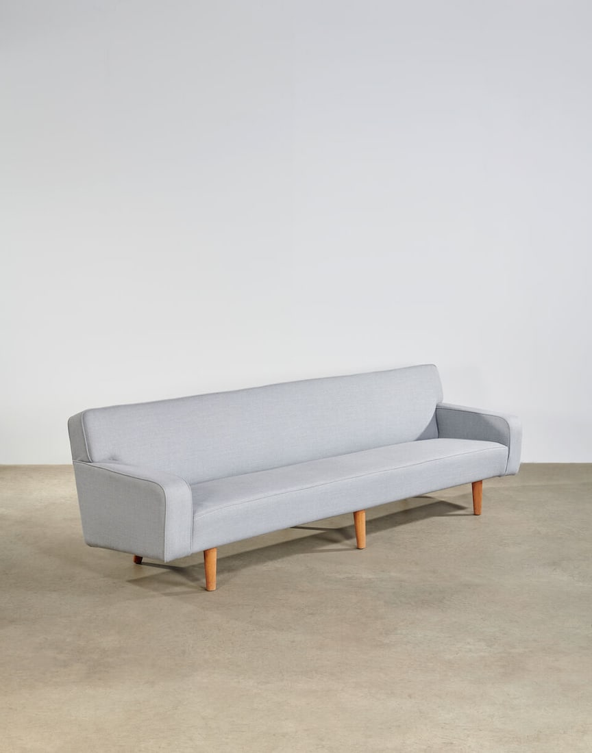 HANS WEGNER (1914-2007) Sofacirca 1955model no. AP33S, for A.P. Stolen, oak, upholsteryheight 30...: HANS WEGNER (1914-2007) Sofa circa 1955 model no. AP33S, for A.P. Stolen, oak, upholstery height 30 1/2in (77cm), width 100in (254cm); depth 25in (63cm) Lot to be sold without reserve. This lot is sub