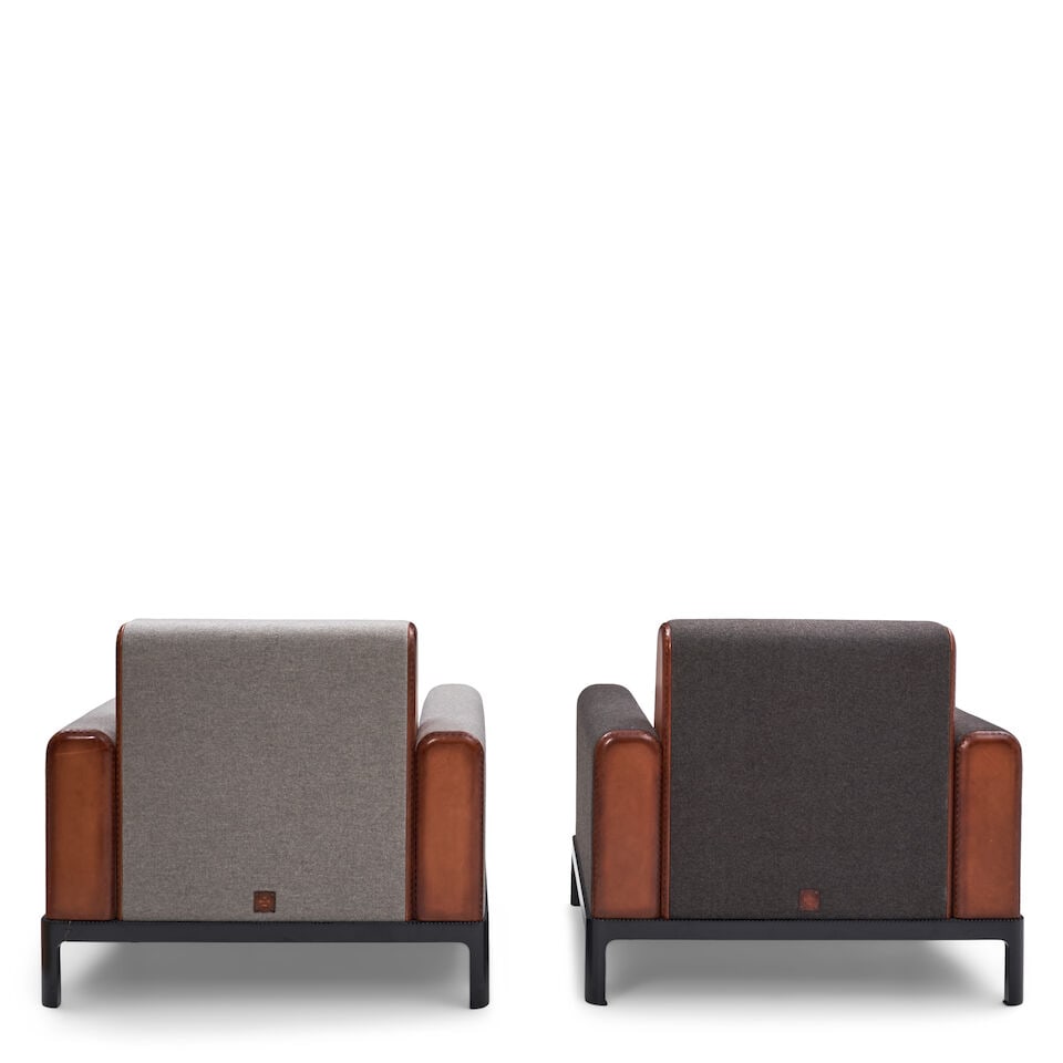 TWO BERLUTI 'SWANN' CLUB CHAIRS AND ONE OTTOMAN Paris, France, c. 2021, leather, wool, enameled ... - 2