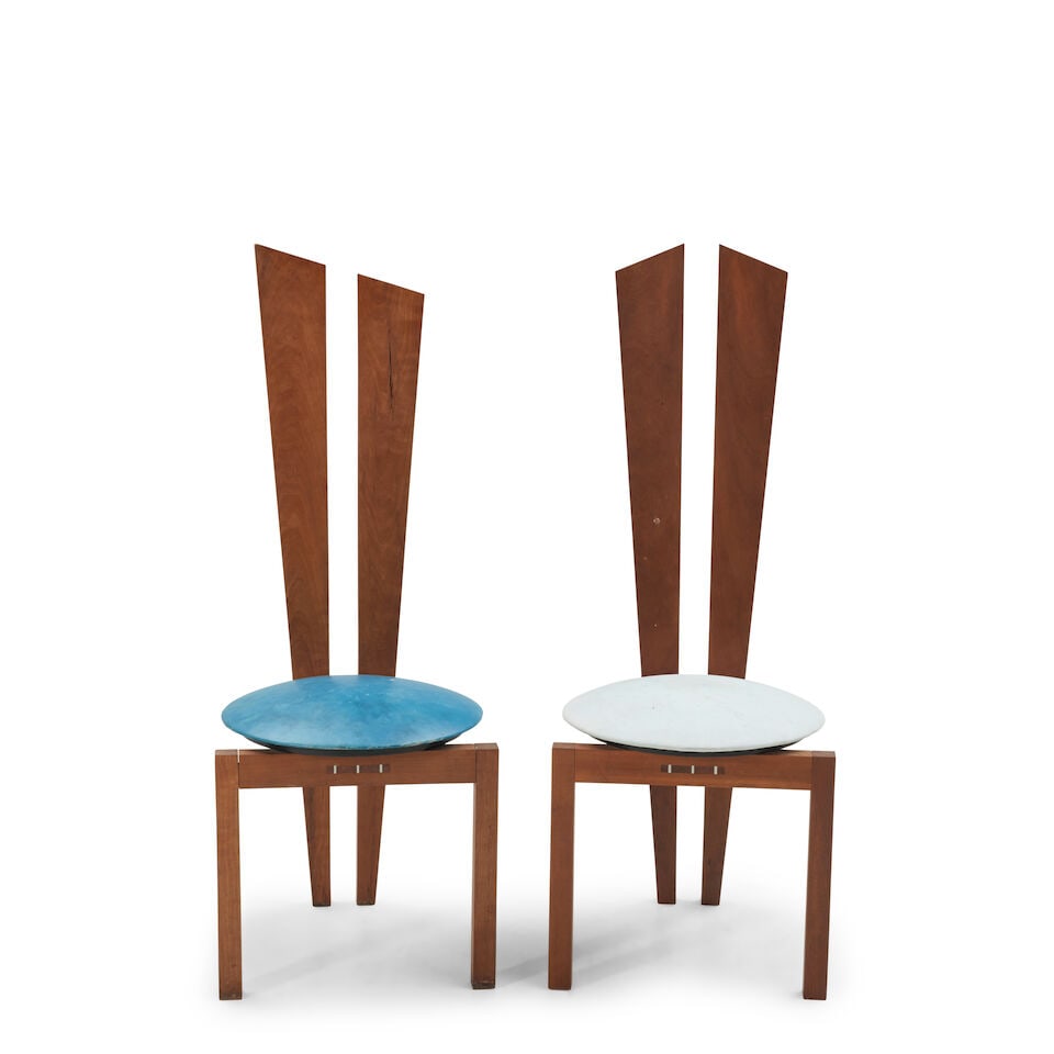 TWO STUDIO FURNITURE HIGHBACK SIDE CHAIRS United States, c. 1980, walnut, plastic and faux swede... (1 of 3)