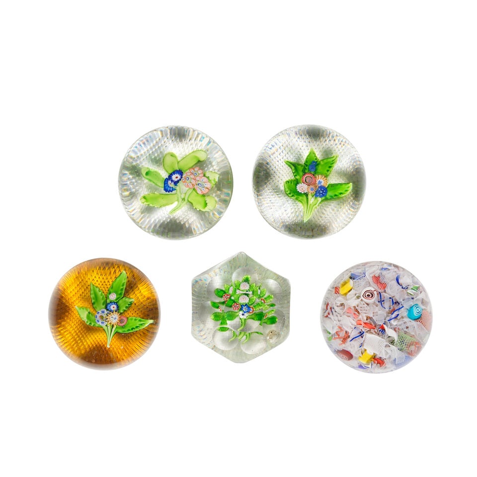 Four St Louis flat bouquet paperweights and a Baccarat scrambled paperweight, circa 1850 (1 of 1)