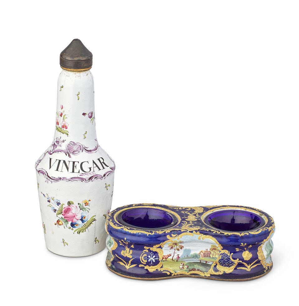 A South Staffordshire enamel cruet stand a large vinegar bottle, circa 1760-70: A South Staffordshire enamel cruet stand a large vinegar bottle, circa 1760-70 The low salt or cruet with dual reserves accommodating blue glass liners, the undulating form finely painted with