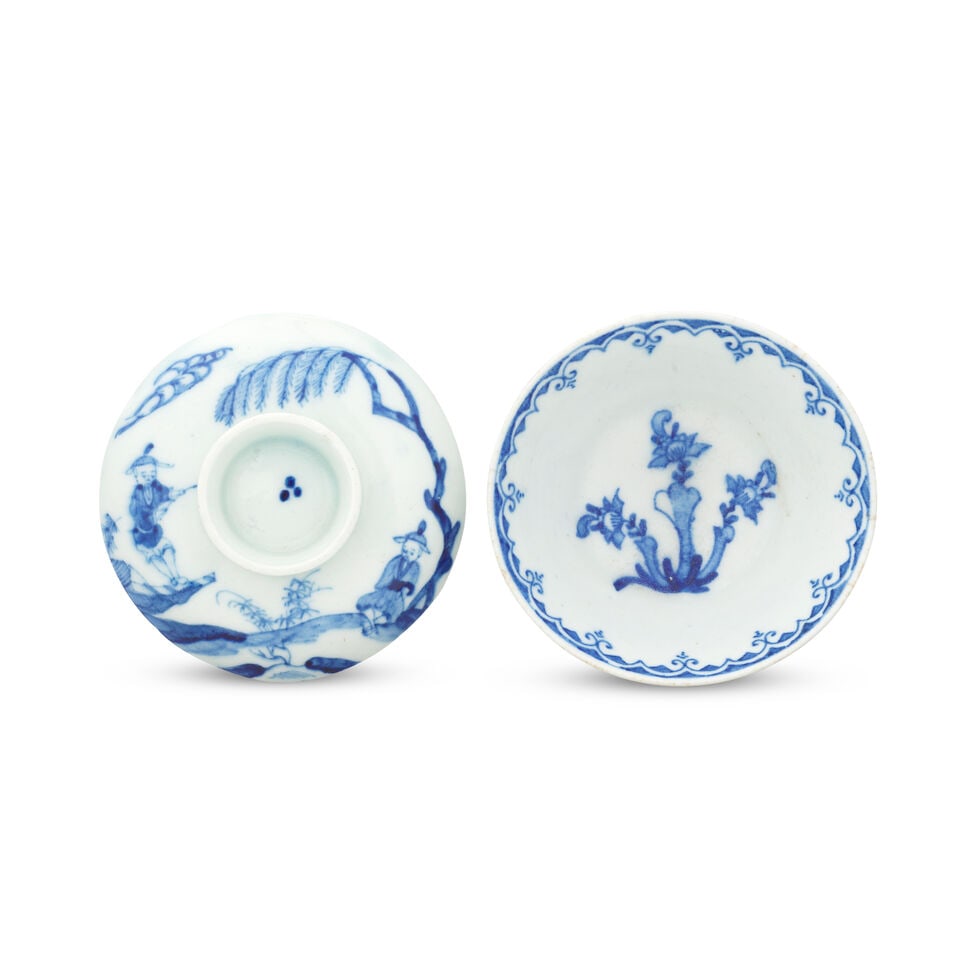 A Bow patty pan and a cover from a sugar bowl, circa 1752-56: A Bow patty pan and a cover from a sugar bowl, circa 1752-56 The patty pan with flared straight sides decorated in bright blue with a stylised flowering plant to the centre, a formal lappet and