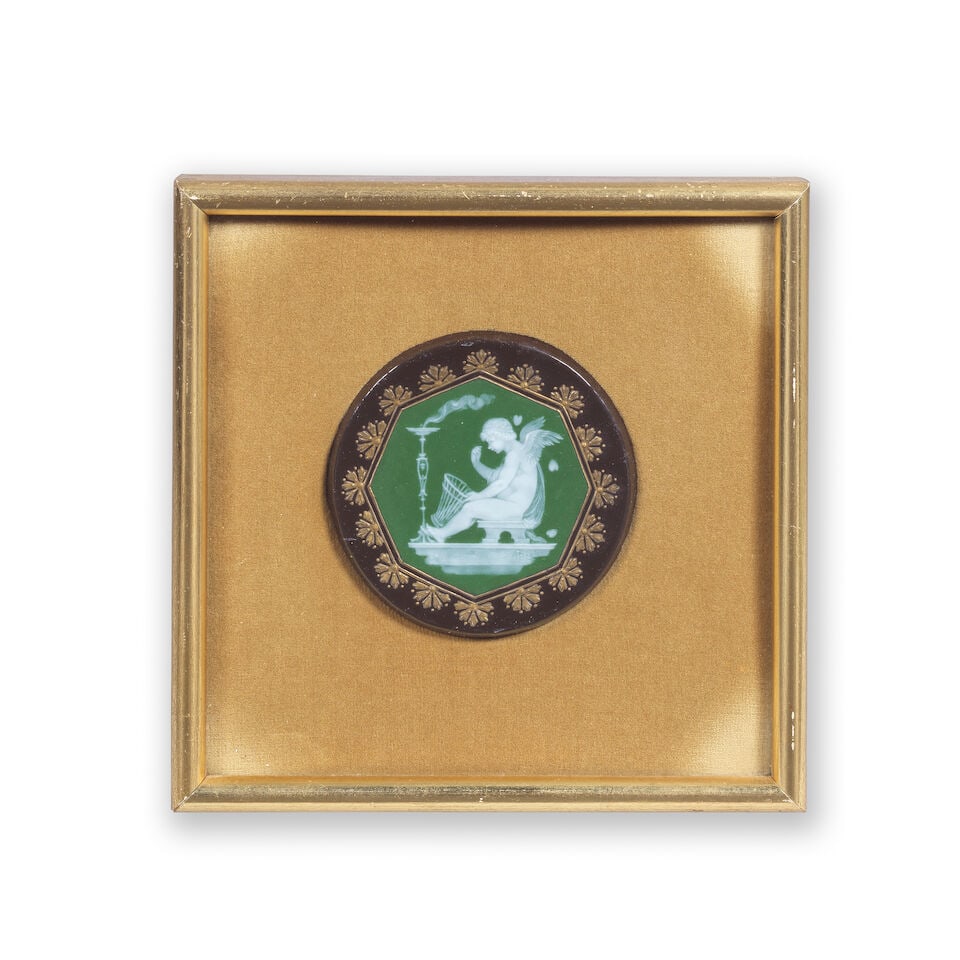 A fine Minton pâte-sur-pâte plaque by Alboin Birks, late 19th century: A fine Minton pâte-sur-pâte plaque by Alboin Birks, late 19th century Of circular form, reserved with an octagonal panel painted in opaque white with a winged Cupid sealed before a tall smok