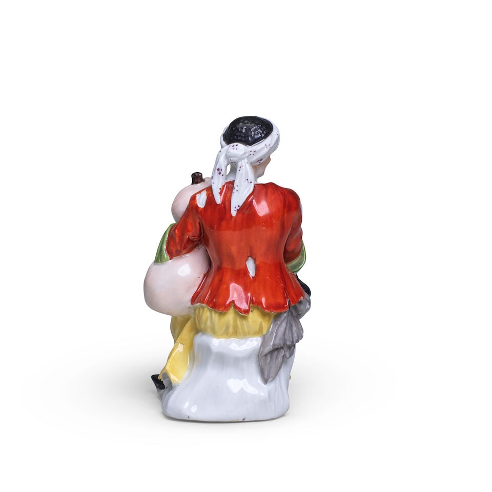 A Meissen figure of a beggar musician, circa 1740 - 2