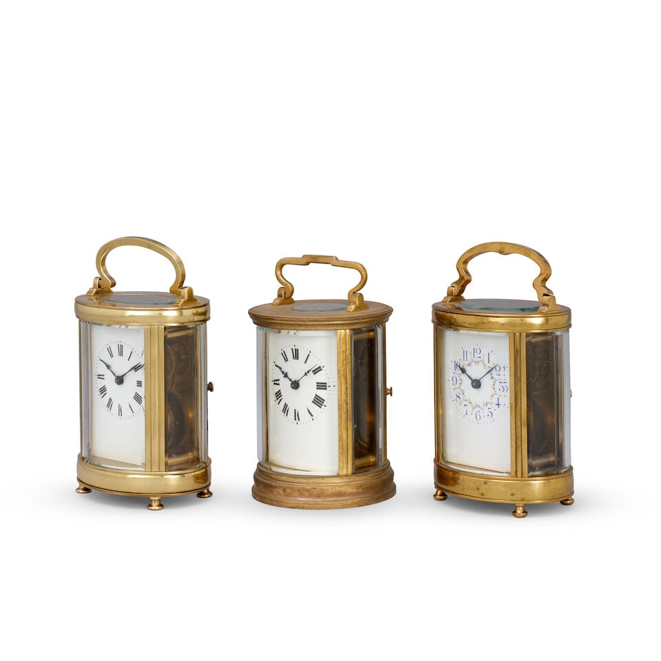 A collection of three early 20th-century oval-shaped French carriage clocks - 2
